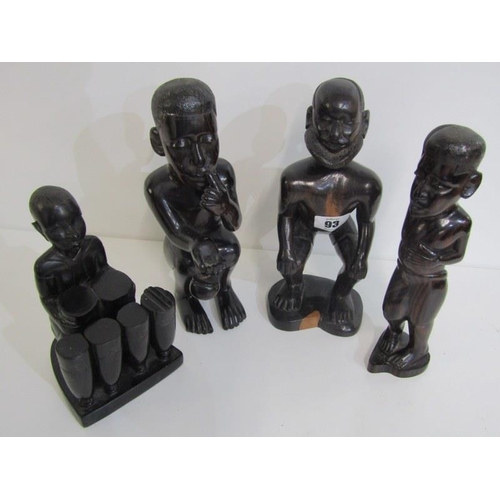 93 - ETHNIC CARVINGS, collection of West African carved hardwood figures, including a drum player, acquir... 