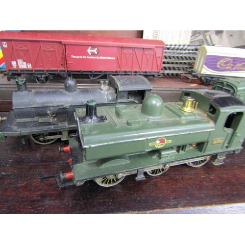 212 - RAILWAYS, 4 x 00 gauge locomotives, Hornby haulage coach, various track, etc all in box