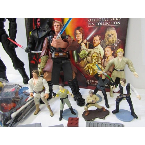 234 - STAR WARS, mixed crate of Star Wars accessories, pin badges, fag bog weapons & a few featured figure... 