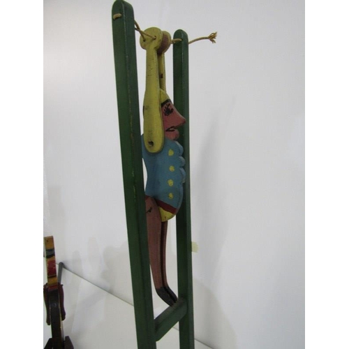 236 - VINTAGE WOODEN TOYS, Gymnast on high ropes, also walking clown on push along stick