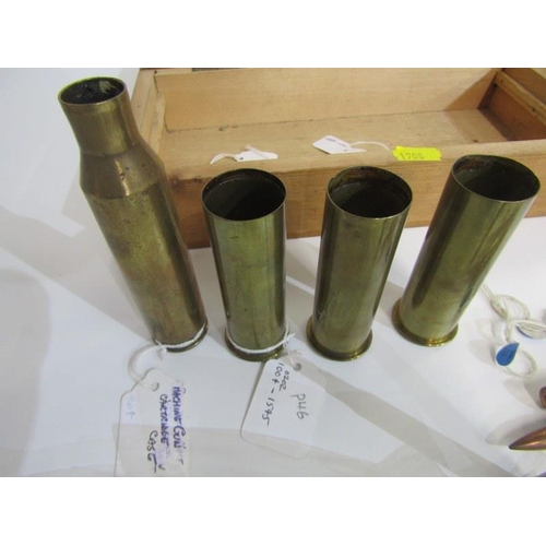 403 - MILITARIA INTEREST, small collection of brass shell cases, also spent bullets recovered from Cold Be... 