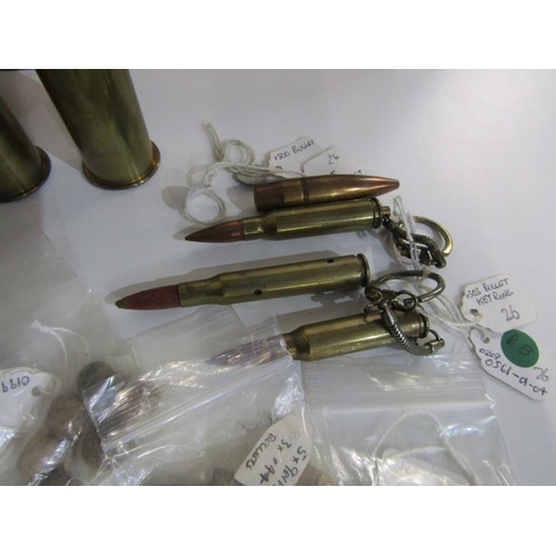 403 - MILITARIA INTEREST, small collection of brass shell cases, also spent bullets recovered from Cold Be... 