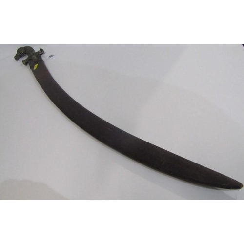 407 - MID EASTERN SABRE, with brass horse head handle, in leather scabbard, 89cm length