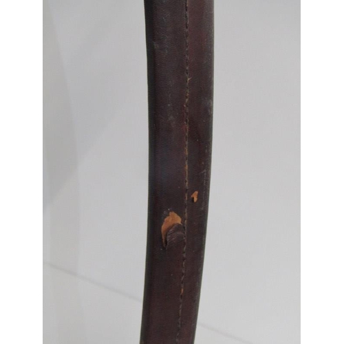 407 - MID EASTERN SABRE, with brass horse head handle, in leather scabbard, 89cm length