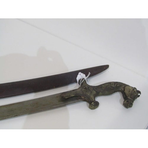 407 - MID EASTERN SABRE, with brass horse head handle, in leather scabbard, 89cm length