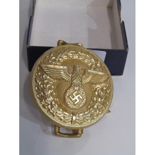 416 - NAZI POLITICAL CLASP BELT BUCKLE, gilt buckle 5.5cm diameter with original retail label attached