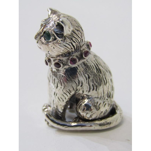 42 - SILVER CAT FIGURE, sterling silver seated cat figure with green glass eyes