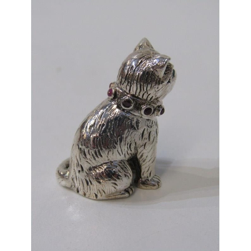 42 - SILVER CAT FIGURE, sterling silver seated cat figure with green glass eyes