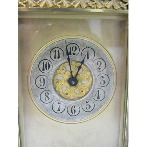 431 - CARRIAGE CLOCK, antique brass bevelled glass carriage clock with shamrock design, border and fluted ... 