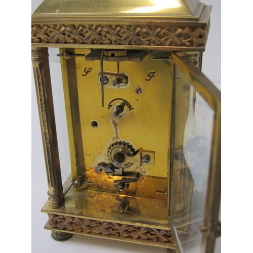 431 - CARRIAGE CLOCK, antique brass bevelled glass carriage clock with shamrock design, border and fluted ... 