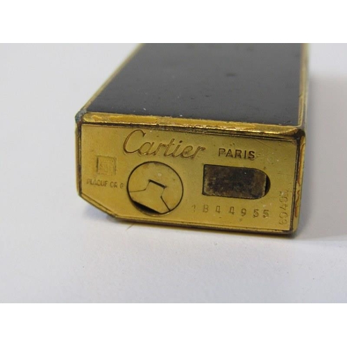 44 - CARTIER, Cartier black and gilt cigarette lighter