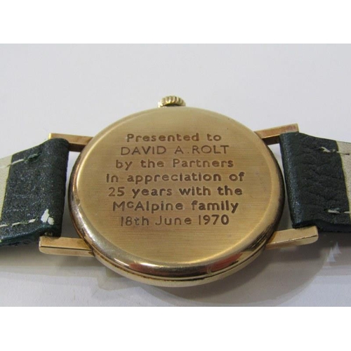 54 - LONGINES, a Gent's Longines gold cased wrist watch on green leather strap with presentation inscript... 