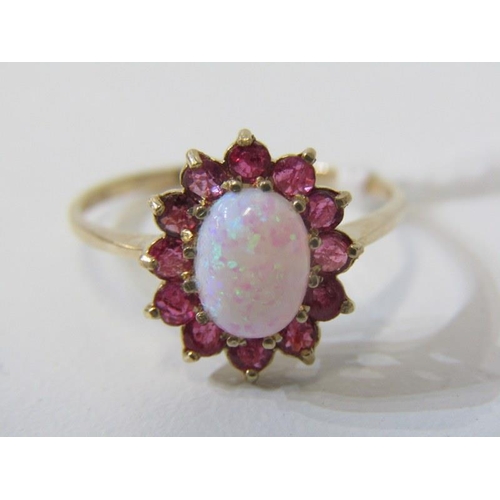 57 - OPAL & RUBY CLUSTER RING, 9ct yellow gold ring, set an oval opal, surrounded by a cluster of rubies,... 