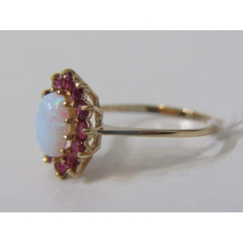 57 - OPAL & RUBY CLUSTER RING, 9ct yellow gold ring, set an oval opal, surrounded by a cluster of rubies,... 