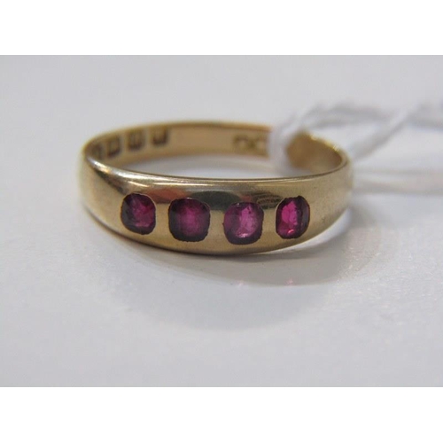 65 - RUBY RING, 18ct yellow gold ring set rubies in half eternity style, size N