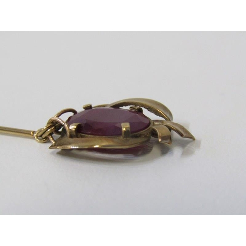 186 - ART NOUVEAU STYLE PENDANT, yellow gold pendant tests as 9ct, set with an oval ruby on a fine link go... 