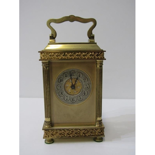 100 - CARRIAGE CLOCK, antique brass bevelled glass carriage clock with shamrock design and fluted column s... 