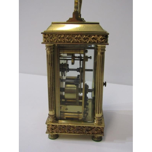 100 - CARRIAGE CLOCK, antique brass bevelled glass carriage clock with shamrock design and fluted column s... 