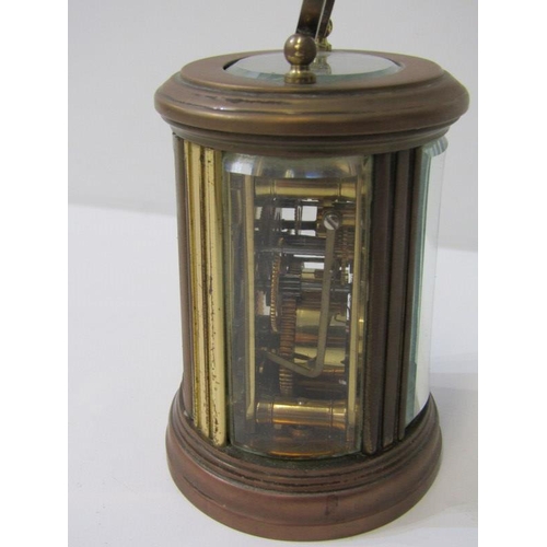 111 - MINIATURE CARRIAGE CLOCK, oval case body with alarm bell base, inscribed 