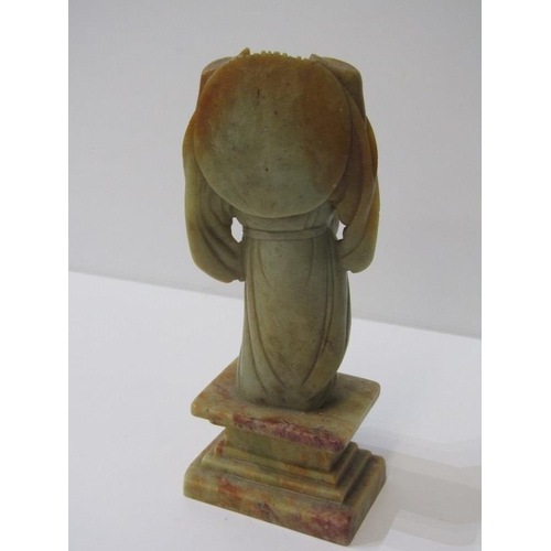 114 - ORIENTAL CARVING, a carved soapstone figure on plinth, 18cm height