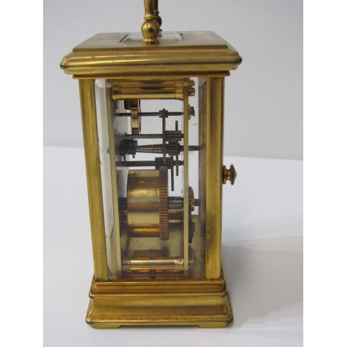 118 - CARRIAGE CLOCK, plain brass case bevelled glass carriage clock by St James with key