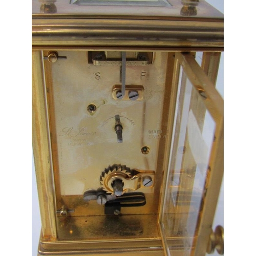 118 - CARRIAGE CLOCK, plain brass case bevelled glass carriage clock by St James with key