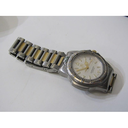 167 - TAG HEUER WRIST WATCH,  Professional model 4000 wrist watch with original dated guarantee for May 19... 