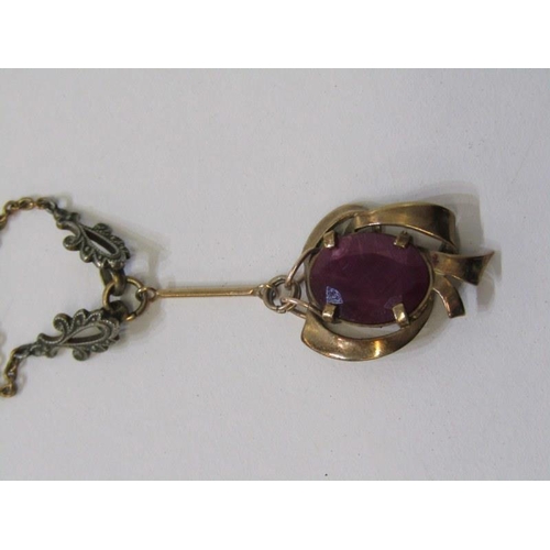 186 - ART NOUVEAU STYLE PENDANT, yellow gold pendant tests as 9ct, set with an oval ruby on a fine link go... 