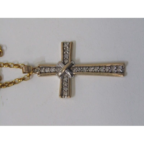 189 - DIAMOND ENCRUSTED CROSS, 9ct yellow gold cross, set 21 round brilliant cut diamonds, on a 9ct yellow... 