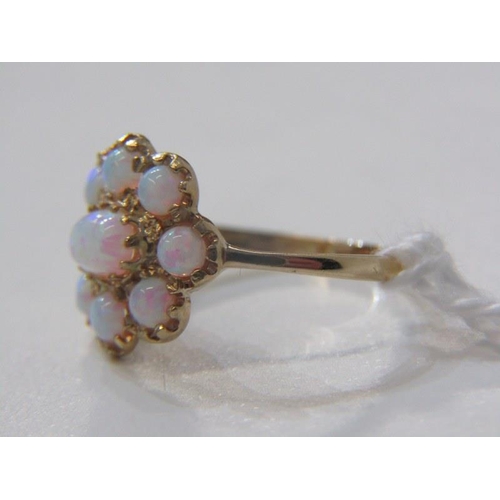 235 - OPAL CLUSTER RING, 9ct yellow gold ring, set an oval opal in a cluster of further opals, size N/O