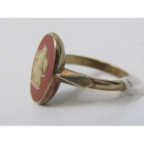 243 - GOLD CAMEO RING, yellow gold ring (tests as high carat) set an oval plaque cameo