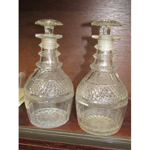 34 - GEORGIAN GLASSWARE, pair of triple banded neck cut glass decanters and stoppers, also pair of oval s... 