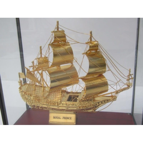 67 - MARITIME, cabinet cased gilt model of galleon 