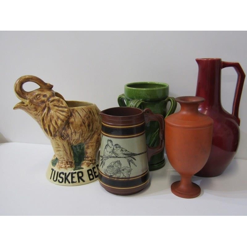 26 - ADVERTISING, 'Tusker Beer' elephant jug, Dresser-style red glazed jug and 3 other pieces