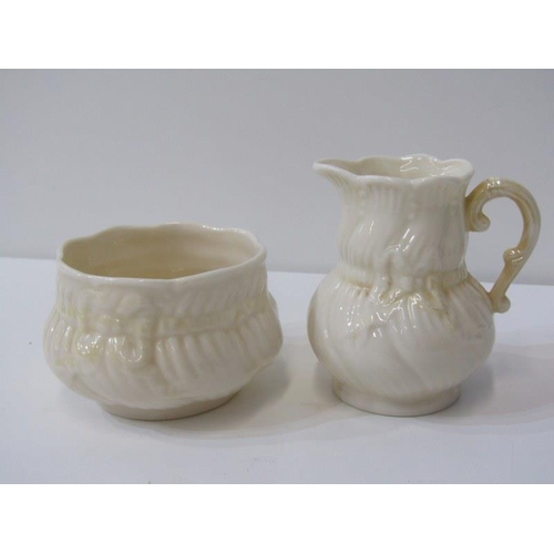 31 - BELLEEK, shell designed, teapot, milk jug and sugar bowl, also biscuit barrel and 2 other pieces