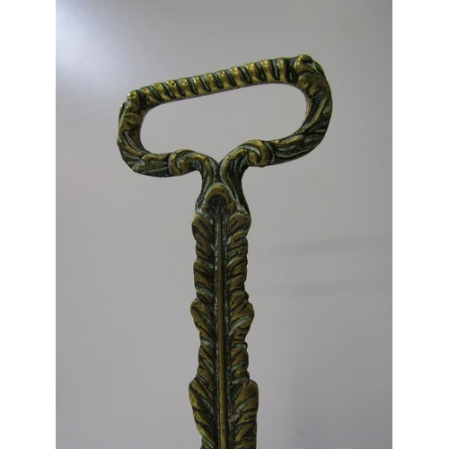 42 - ANTIQUE BRASS DOORSTOP, in the form of a lion's foot