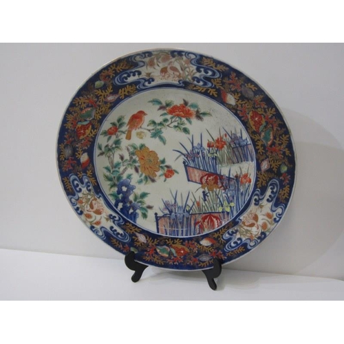 21 - ORIENTAL CERAMICS, a good Arita charger decorated with birds within garden setting, 37cm diameter