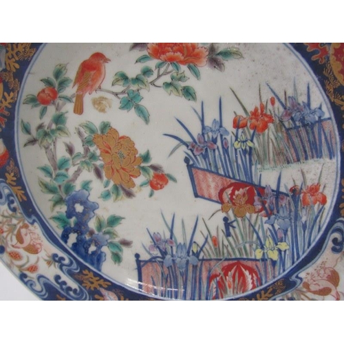 21 - ORIENTAL CERAMICS, a good Arita charger decorated with birds within garden setting, 37cm diameter