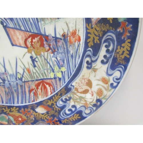 21 - ORIENTAL CERAMICS, a good Arita charger decorated with birds within garden setting, 37cm diameter