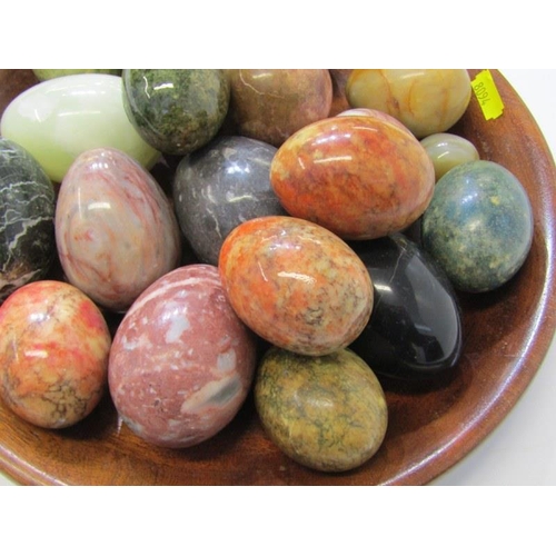 27 - HAND COOLERS, a good collection of coloured stone hand coolers within wooden dish