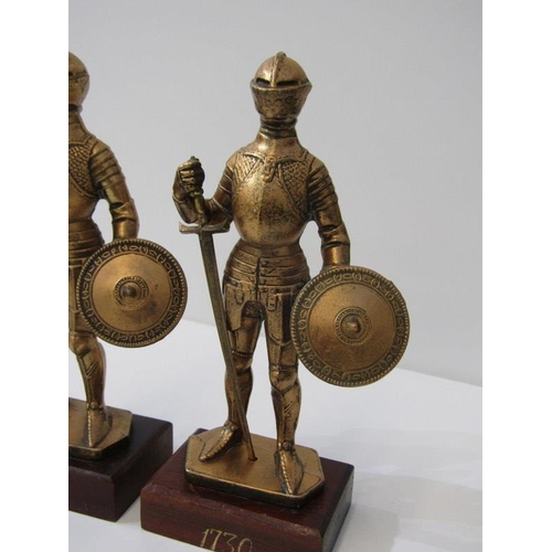 46 - MILITARY MODELS, pair of gilt model figures of armoured knights, dated 1730 on base