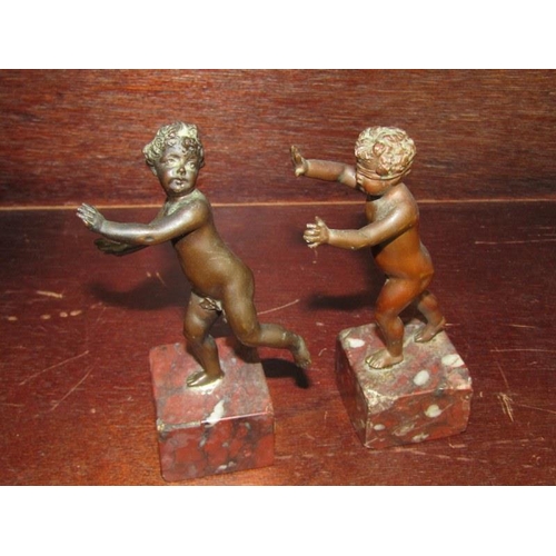 58 - ANTIQUE BRONZE FIGURES, pair of serpentine base bronze putti, 13cm height