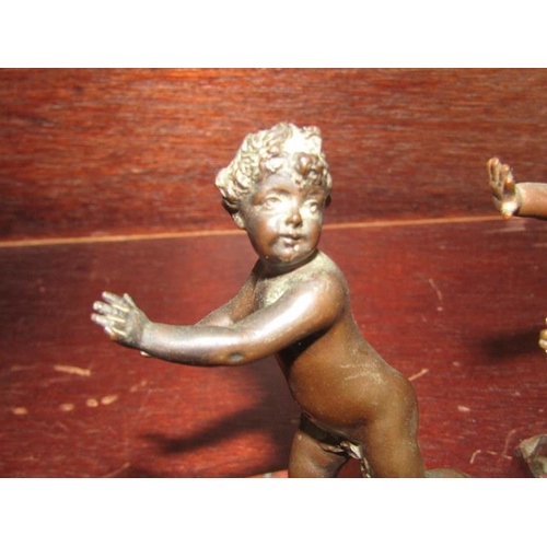 58 - ANTIQUE BRONZE FIGURES, pair of serpentine base bronze putti, 13cm height