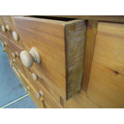 758 - MODERN PINE COMPENDIUM OF DRAWERS, 180cm width