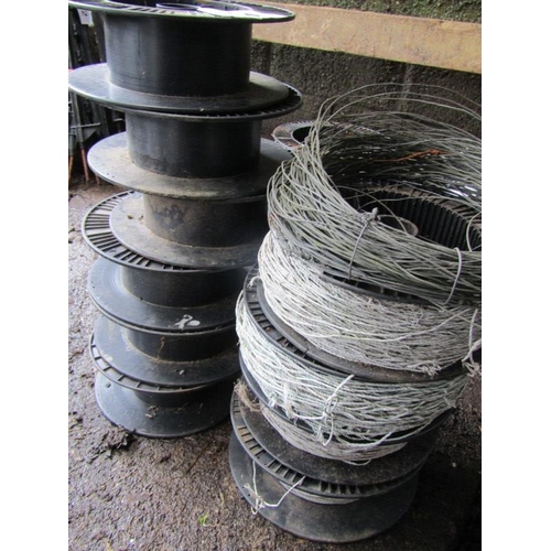 34 - 4 Assorted rolls of electric fencing wire, also spare wire reels