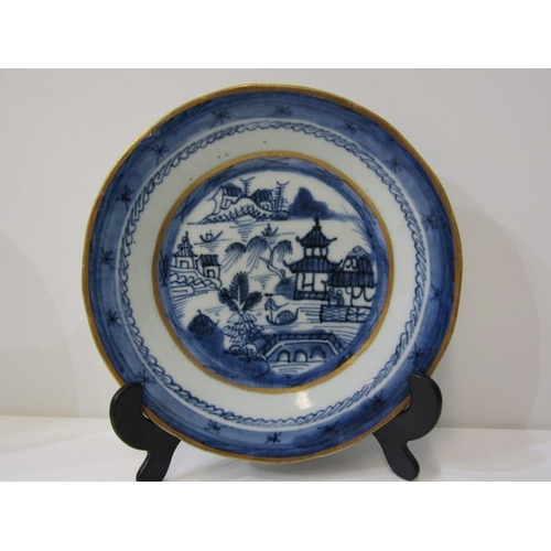 31 - ORIENTAL CERAMICS, a Canton porcelain plate and bowl decorated with buildings along a riverside, wit... 