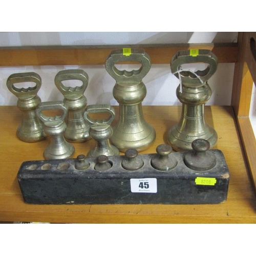 45 - BRASS BELL WEIGHTS, set of brass bell weights, together with part graduated set of weights on stand