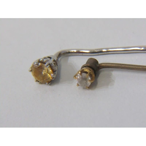 102 - DIAMOND STICK PINS, 9ct stick pin set a diamond, also a white metal stick pin, possibly platinum, se... 