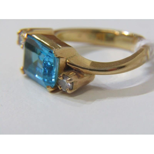 110 - TOPAZ & DIAMOND RING, yellow gold ring, (tests as 18ct, bought in the Middle East) set an emerald cu... 