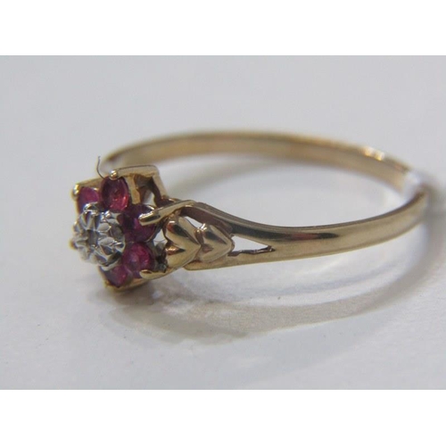 134A - RUBY AND DIAMOND CLUSTER RING, 9ct yellow gold ring set with a central diamond, surrounded by a clus... 